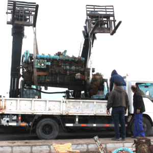 The vessel's engine being loaded for transport to Marpa Co. Ltd, who generously undertook its repair.